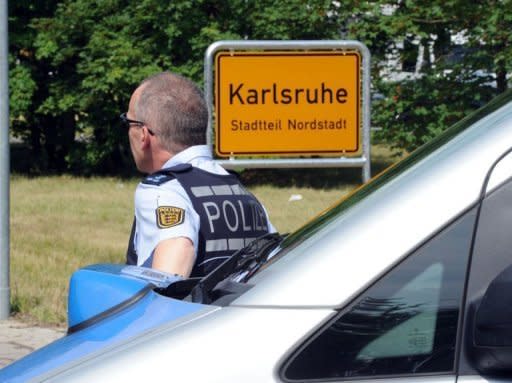 German police say three or four people were killed after a gunman took people hostage during a home eviction in southwestern Germany