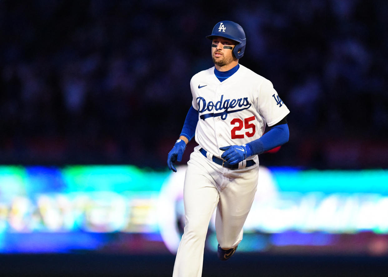 Apr 1, 2023; Los Angeles, California, USA; Los Angeles Dodgers center fielder Trayce Thompson (25) runs to home after hitting a home run against the Arizona Diamondbacks during the fifth inning at Dodger Stadium. Mandatory Credit: Jonathan Hui-USA TODAY Sports