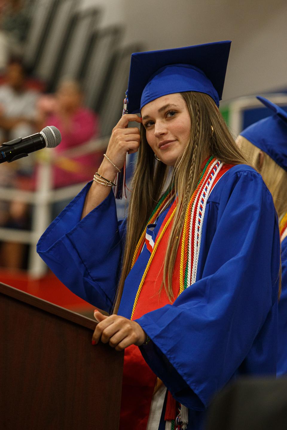 Katie Hill, Senior Class President, adjusts her tassel at the Mount Pleasant High School graduation ceremony in Mount Pleasant, Tenn. on May 19, 2023.