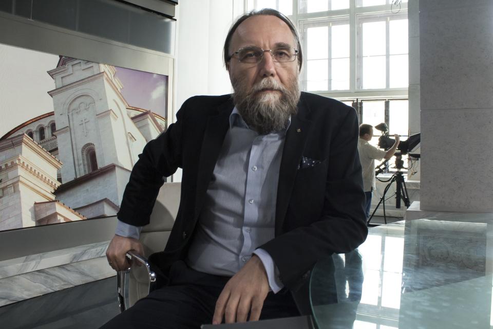 FILE - In this photo taken on Thursday, Aug. 11, 2016, Alexander Dugin, the neo-Eurasianist ideologue, sits in his TV studio in central Moscow, Russia. The daughter of this Russian nationalist ideologist who is often referred to as “Putin's brain”, was killed when her car exploded on the outskirts of Moscow, officials said Sunday, Aug. 21, 2022. (AP Photo/Francesca Ebel, File)