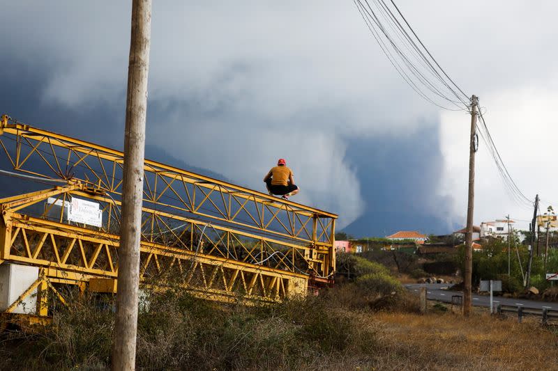 Lava and smoke rise following the eruption of a volcano on the Canary Island of La Palma