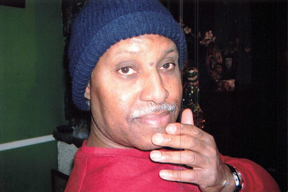 Larry Jackson Jr., wearing a beanie, smiles for the camera. In his 50s, he changed careers, becoming a substitute teacher in the Kansas City, Kansas, school district.