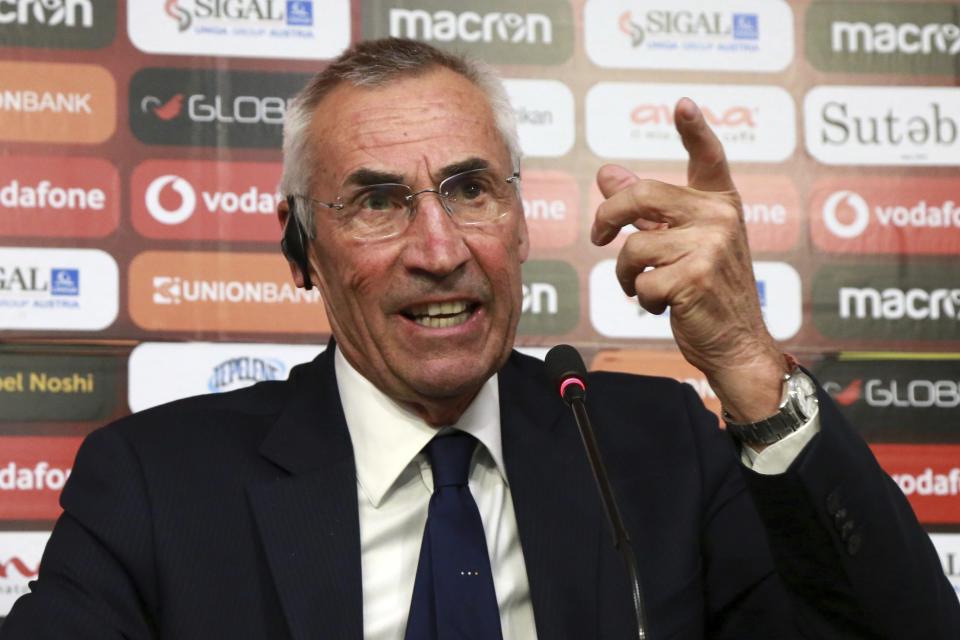 Italian Edoardo Reja, the new coach of Albania national soccer team, answers a question during a news conference in Tirana, Wednesday, April 17, 2019. The Albanian football federation has signed a seven-month contract with Italian Edoardo 'Edy' Reja as its national team coach and he keeps the post until the end of the European Championship qualifiers in November. (AP Photo/Hektor Pustina)