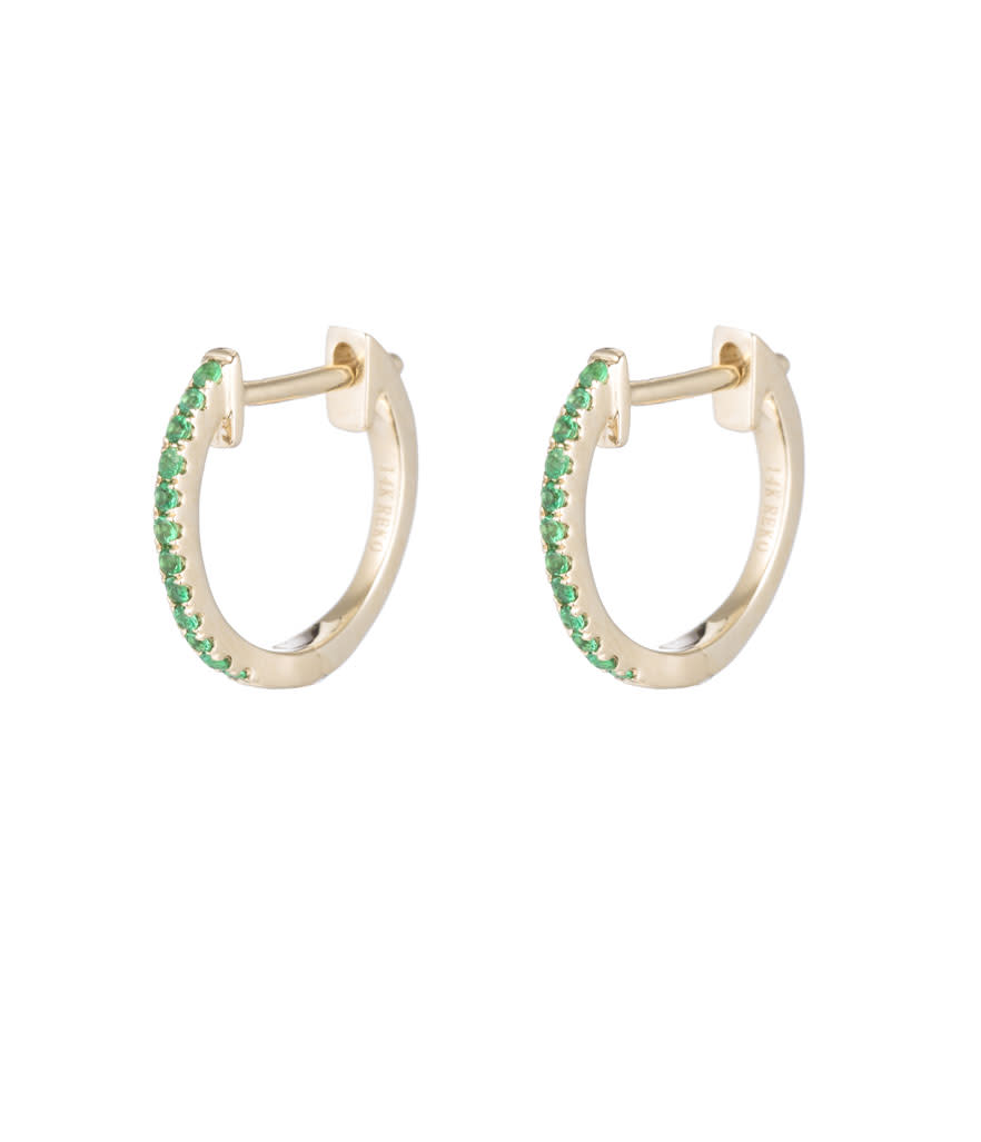 <p>14-karat yellow gold-and-emerald pavé huggies, $695, <a rel="nofollow noopener" href="https://www.arielgordonjewelry.com/collections/earrings/products/emerald-pave-huggies" target="_blank" data-ylk="slk:arielgordonjewelry.com;elm:context_link;itc:0;sec:content-canvas" class="link ">arielgordonjewelry.com</a> </p>