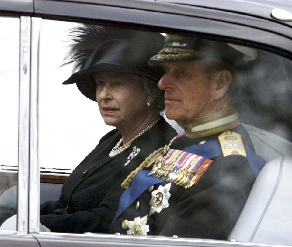 queen and philip in car