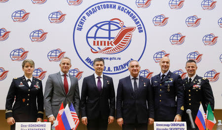 Astronauts, (L-R) Anne McClain of the U.S., David Saint-Jacques of Canada, Oleg Kononenko of Russia, Alexander Skvortsov of Russia, Luca Parmitano of Italy and Andrew Morgan of the U.S., attend a news conference, dedicated to the next mission to the International Space Station (ISS), in Star City near Moscow, Russia November 15, 2018. REUTERS/Maxim Shemetov