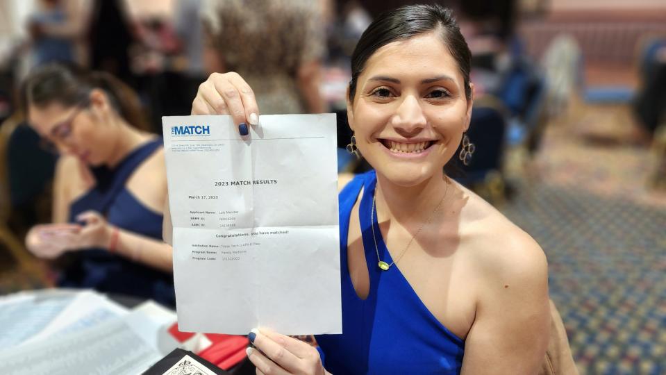 Lois Mendez shows off her residency assignment in her hometown of El Paso at the 2023 Match Day, held in downtown Amarillo.