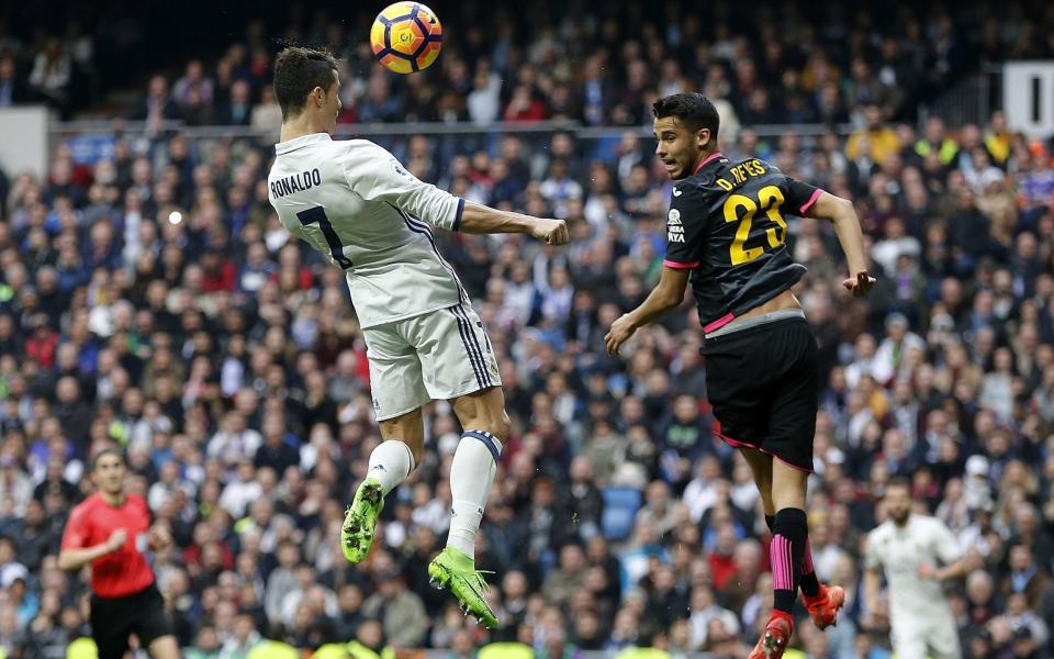 Cristiano Ronaldo leaps highest to head the ball for Real Madrid - GETTY IMAGES