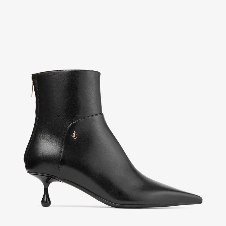 <p><a href="https://go.redirectingat.com?id=74968X1596630&url=https%3A%2F%2Fus.jimmychoo.com%2Fen%2Fwomen%2Fshoes%2Fboots%2Fcycas-ankle-boot-50%2Fblack-nappa-leather-ankle-boots-CYCASAB50NAP010003.html%3Fcgid%3Dwomen-shoes-boots&sref=https%3A%2F%2F" rel="nofollow noopener" target="_blank" data-ylk="slk:Shop Now;elm:context_link;itc:0;sec:content-canvas" class="link ">Shop Now</a></p><p>Cycas Ankle Boot 50</p><p>jimmychoo.com</p><p>$1275.00</p>