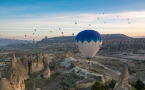 <p>At the <a rel="nofollow noopener" href="http://www.goreme.com/uchisar.php" target="_blank" data-ylk="slk:highest point in Cappadocia;elm:context_link;itc:0;sec:content-canvas" class="link ">highest point in Cappadocia</a>, Uçhisar is another popular town for tourists to reside in. Home to <a rel="nofollow noopener" href="https://www.expedia.com/Uchisar-Castle-Nevsehir.d6184016.Vacation-Attraction" target="_blank" data-ylk="slk:Uçhisar Castle;elm:context_link;itc:0;sec:content-canvas" class="link ">Uçhisar Castle</a>, this rock citadel offers a beautiful panoramic view of the region and Mount Erciyes.</p>