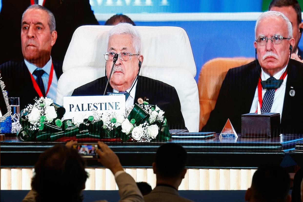 Palestinian President Mahmud Abbas attending the International Peace Summit hosted by the Egyptian president in Cairo on Saturday (AFP via Getty Images)