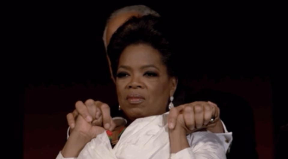 Oprah looking comforting