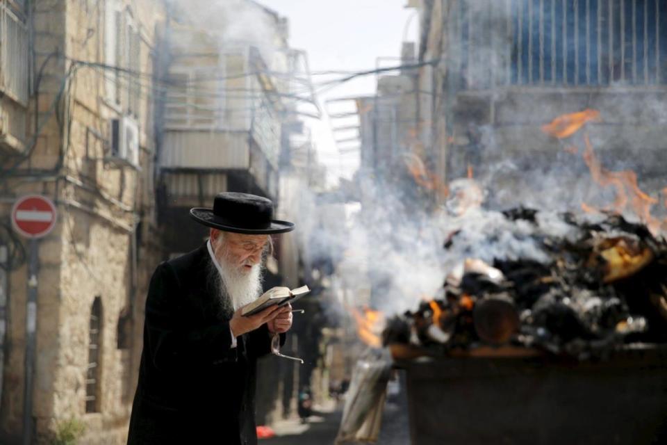 Reading a prayer on Passover