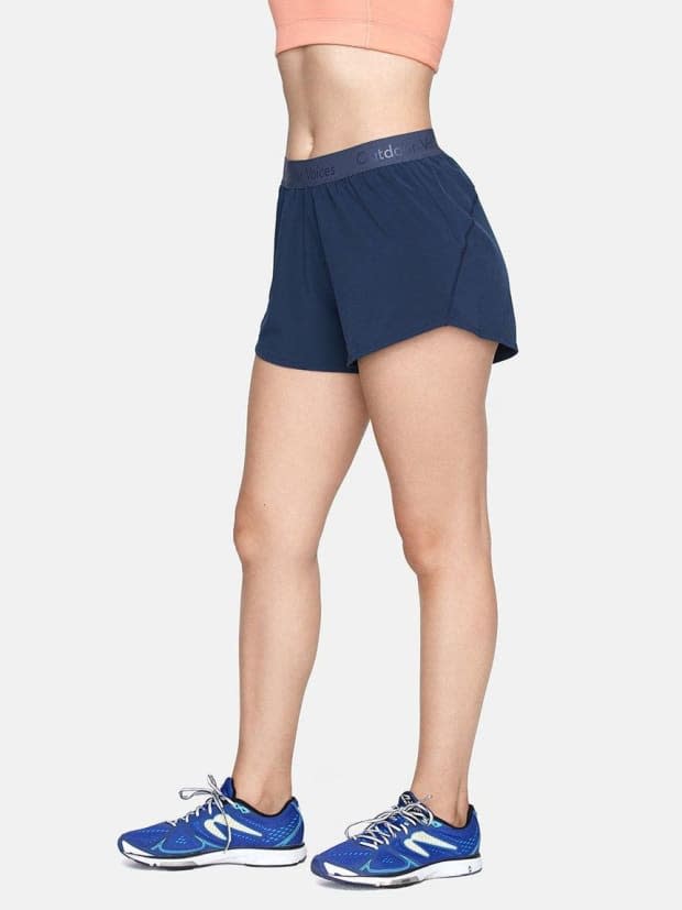 <p><strong>Outdoor Voices Relay Shorts, $45, <a href="https://rstyle.me/+fJYjSNh6O7G28sBySidIHw" rel="nofollow noopener" target="_blank" data-ylk="slk:available here;elm:context_link;itc:0;sec:content-canvas" class="link ">available here</a>: </strong>"I like to buy loose-fitting shorts like this to hang around the house and run errands (when it's not cold out). I'm into the deep navy color on these and that they have a hidden pocket." —Ana Colón, Senior Editor </p>