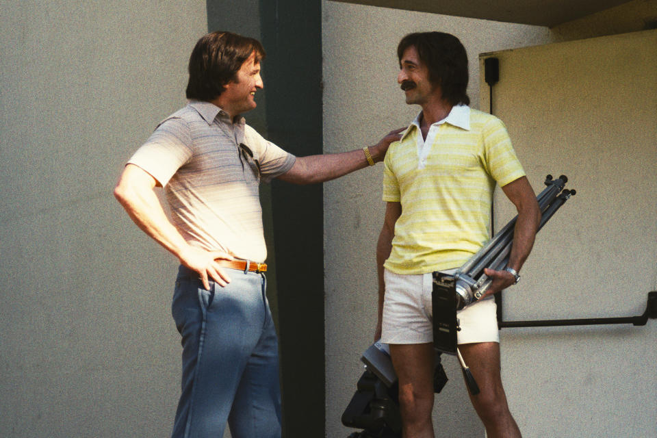 John C. Reilly as Jerry Buss puts his hand on the shoulder of Adrien Brody as Pat Riley in "Winning Time"