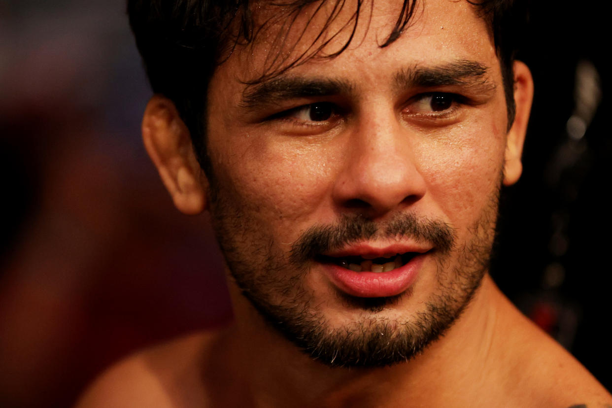 DALLAS, TEXAS - JULY 30: Alexandre Pantoja of Brazil exits the octagon after submitting Alex Perez in the first round of their flyweight bout during UFC 277 at American Airlines Center on July 30, 2022 in Dallas, Texas. (Photo by Carmen Mandato/Getty Images)