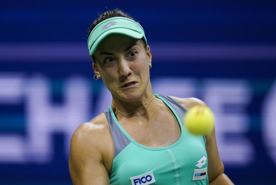 Danka Kovinic, of Montenegro, returns a shot to Serena Williams, of the United States, during the first round of the US Open tennis championships, Monday, Aug. 29, 2022, in New York. (AP Photo/Charles Krupa)