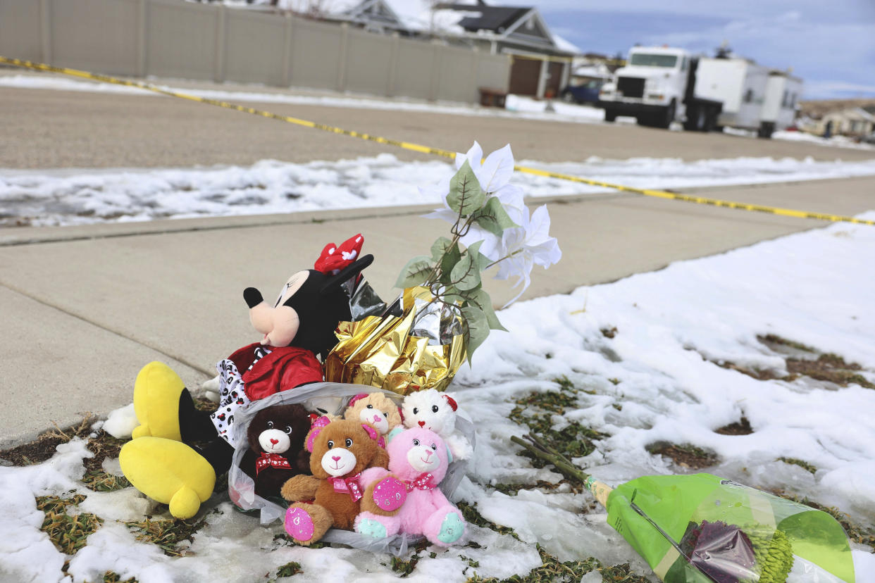 Five stuffed animals left by the the Enoch Elementary School PTA are pictured at a makeshift memorial near the police tape at a home where eight members of a family were killed in Enoch, Utah, on Thursday, Jan. 5, 2023. (Laura Seitz/The Deseret News via AP)