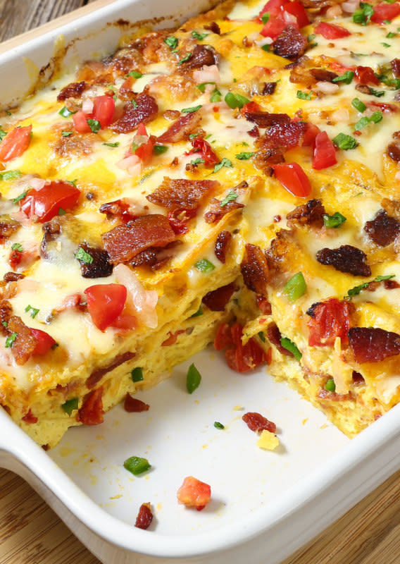 The Slow Roasted Italian<p>With layer upon layer of delicious Mexican flavors, corn tortillas, bacon and ooey gooey cheese all wrapped up in a scrumptious breakfast casserole. </p><p><strong>Get the recipe: </strong><strong><a href="https://www.theslowroasteditalian.com/2017/04/mexican-lasagna-breakfast-casserole.html" rel="sponsored" target="_blank" data-ylk="slk:Mexican Lasagna Breakfast Casserole;elm:context_link;itc:0;sec:content-canvas" class="link ">Mexican Lasagna Breakfast Casserole</a></strong></p>