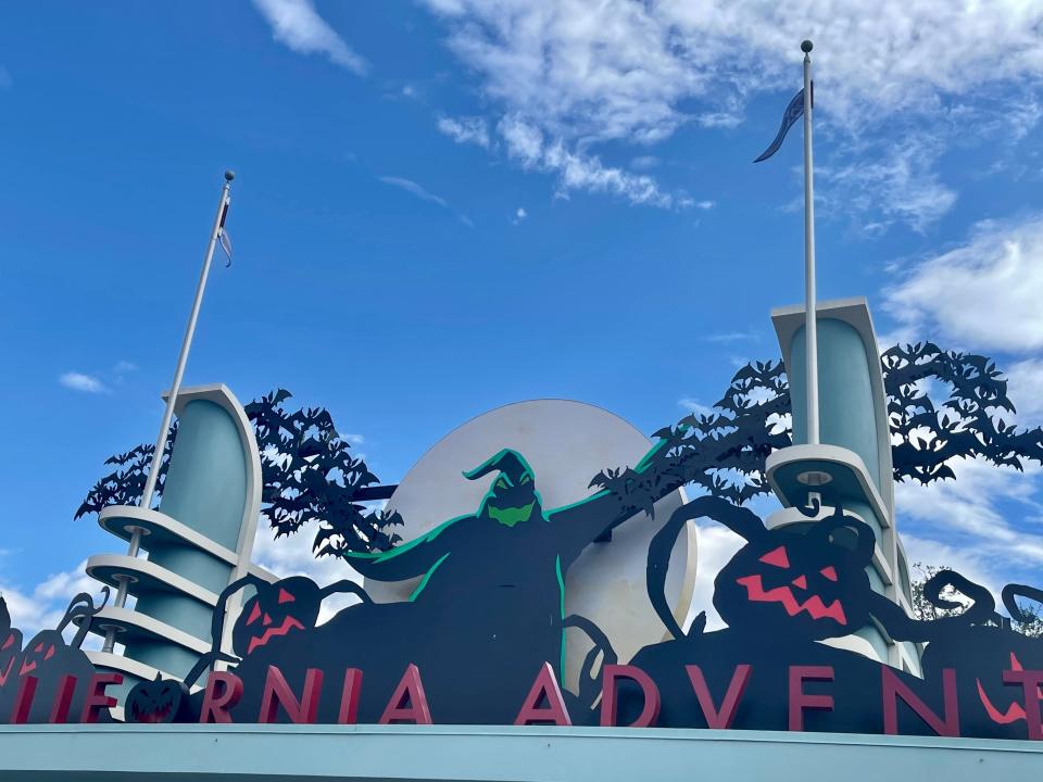 oogie boogie decorations on the entrance sign for disney's california adventure park