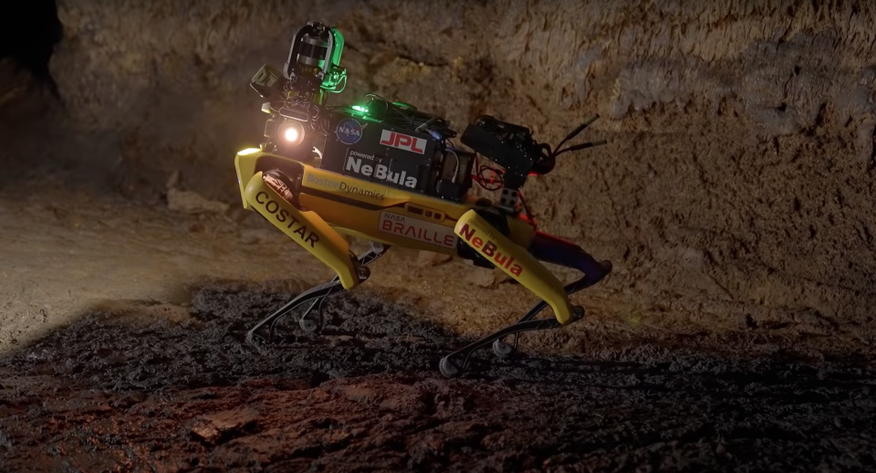 A "Spot" robot dog searching "Martian-like" caves on Earth for scientific samples.
