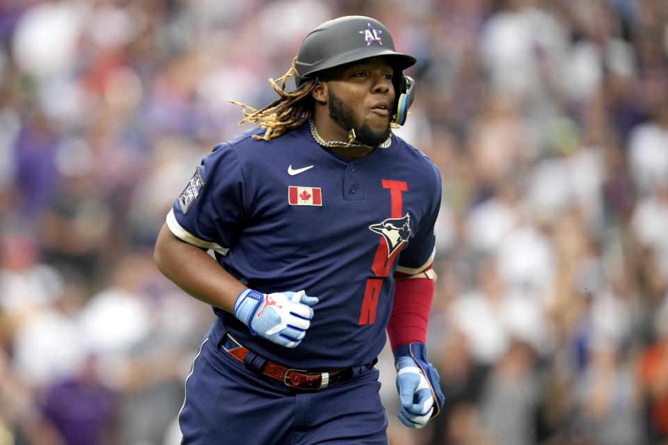 American League's Vladimir Guerrero Jr., of the Toronto Blue Jays, runs out his solo home run during the third inning of the MLB All-Star baseball game, Tuesday, July 13, 2021, in Denver. (AP Photo/David Zalubowski)