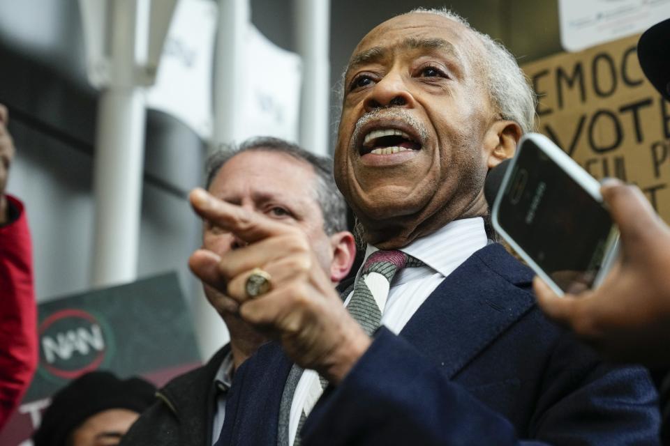 Rev. Al Sharpton speaks to the media during a protest outside the office of hedge fund billionaire Bill Ackman, who has donated millions to Harvard, to protest his campaign against diversity, equity, and inclusion Thursday, Jan. 4, 2024, in New York. Harvard University President Claudine Gay resigned Tuesday amid plagiarism accusations and criticism over testimony at a congressional hearing where she was unable to say unequivocally that calls on campus for the genocide of Jews would violate the school's conduct policy. (AP Photo/Frank Franklin II)