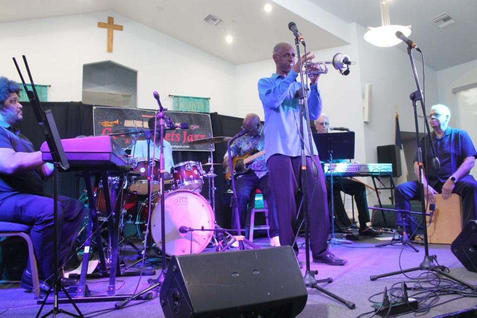 Trumpeter Lanard Perry, center, leads the Gospel Meets Jazz Band during a performance Friday at DaySpring Baptist Church in NE Gainesville.
(Photo: Photo by Voleer Thomas/For The Guardian)