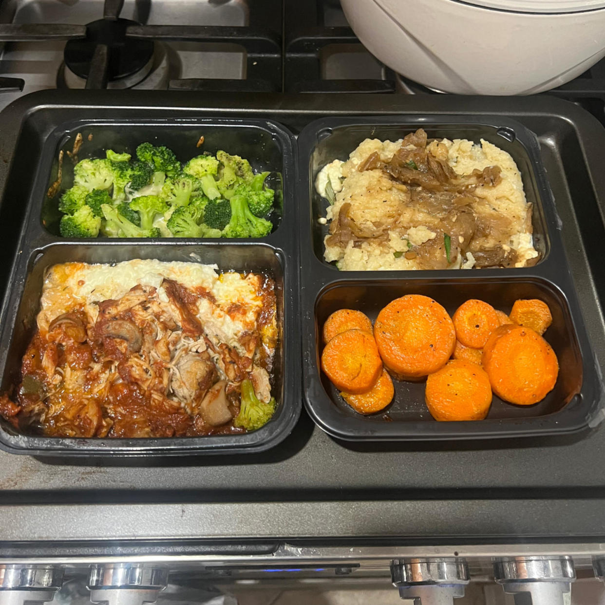 Two Factor meals side by side on a stovetop. (Courtesy of Mili Godio; Factor)