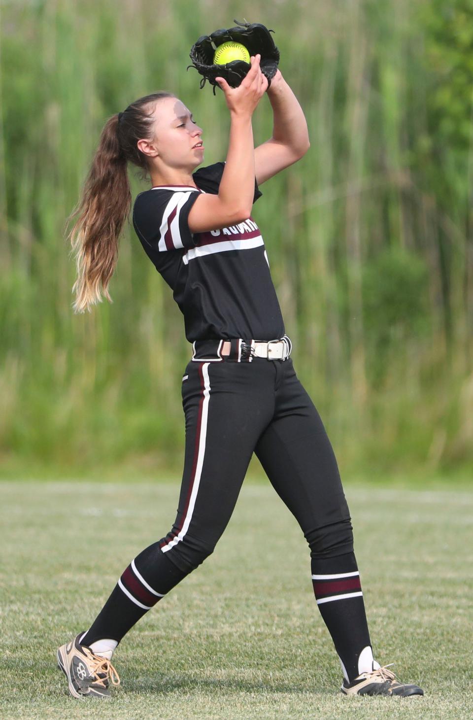 Appoquinimink's Izabella Rodriguez pulls in a fly ball for an out in the Jaguars' 7-2 win against Conrad in the DIAA state tournament opening round, Tuesday, May 23, 2023 at Appoquinimink.