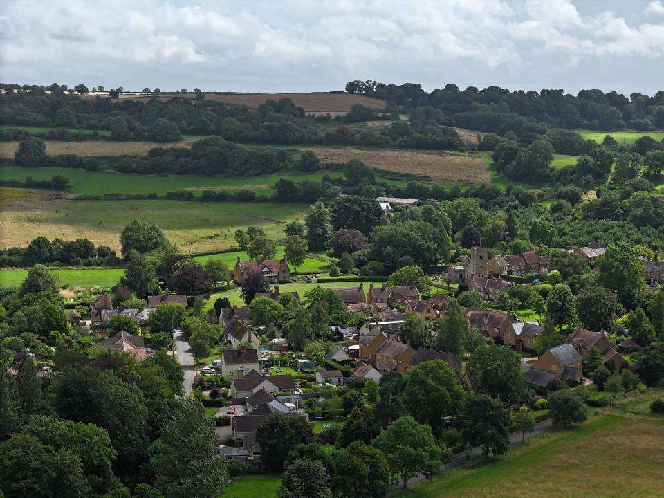 DJI Air 3 aerial photo of village houses on a sunny day with the 70mm telephoto camera