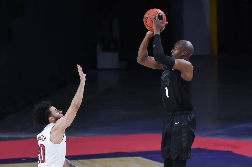 Michigan State Spartans guard Joshua Langford (1) shoots over Nebraska Cornhuskers guard Kobe Webster (10) in the second half Jan. 2, 2021, at Pinnacle Bank Arena.