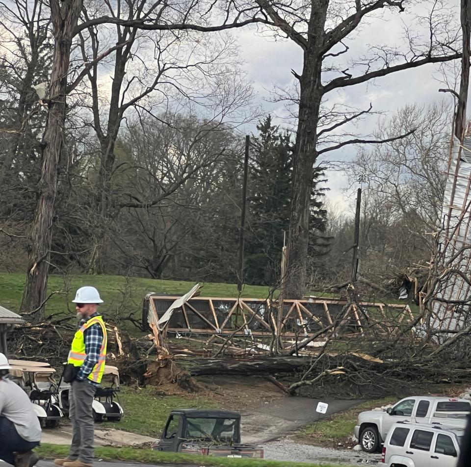 City crews and AEP workers are clearing streets and other areas where high winds left downed powerlines and scattered debris on Wednesday afternoon in Bucyrus.