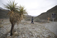 In this Wednesday, March 4, 2020, photograph, a hiker sets off on a trail through Franklin Mountains State Park near El Paso, Texas. With the spread of the new coronavirus, people have turned to the great outdoors for exercise and entertainment in these turbulent times. The new coronavirus causes mild or moderate symptoms for most people, but for some, especially older adults and people with existing health problems, it can cause more severe illness or death. (AP Photo/David Zalubowski)