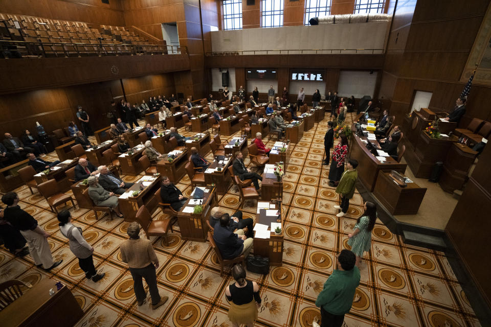 The Portland State University chamber choir sings "Hallelujah" on the first day of the legislative session at the Oregon state Capitol, Monday, Feb. 5, 2024, in Salem, Ore. (AP Photo/Jenny Kane)