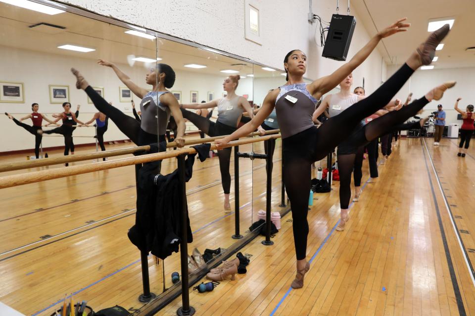 Sasha Bass-Ulmer stretches before a ballet class at July’s Rockettes Conservatory. As ballet is foundational, each day of Conservatory begins at the ballet barre.