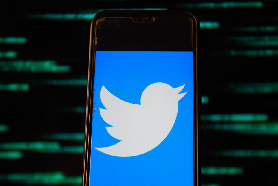 POLAND - 2020/07/15: In this photo illustration a Twitter logo is seen displayed on a smartphone. (Photo Illustration by Omar Marques/SOPA Images/LightRocket via Getty Images)