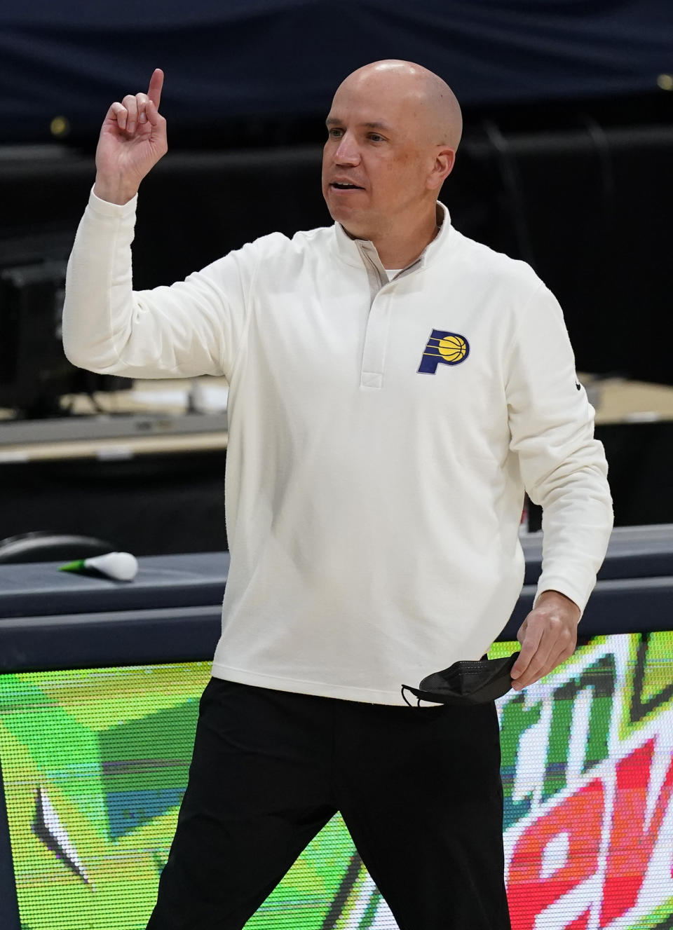 FILE - Indiana Pacers head coach Nate Bjorkgren gestures in the first half of an NBA basketball game against the Nuggets in Denver, in this Monday, March 15, 2021, file photo. The Pacers fired Nate Bjorkgren on Wednesday, June 9, 2021, after missing the playoffs in his only season as coach. (AP Photo/David Zalubowski, File)