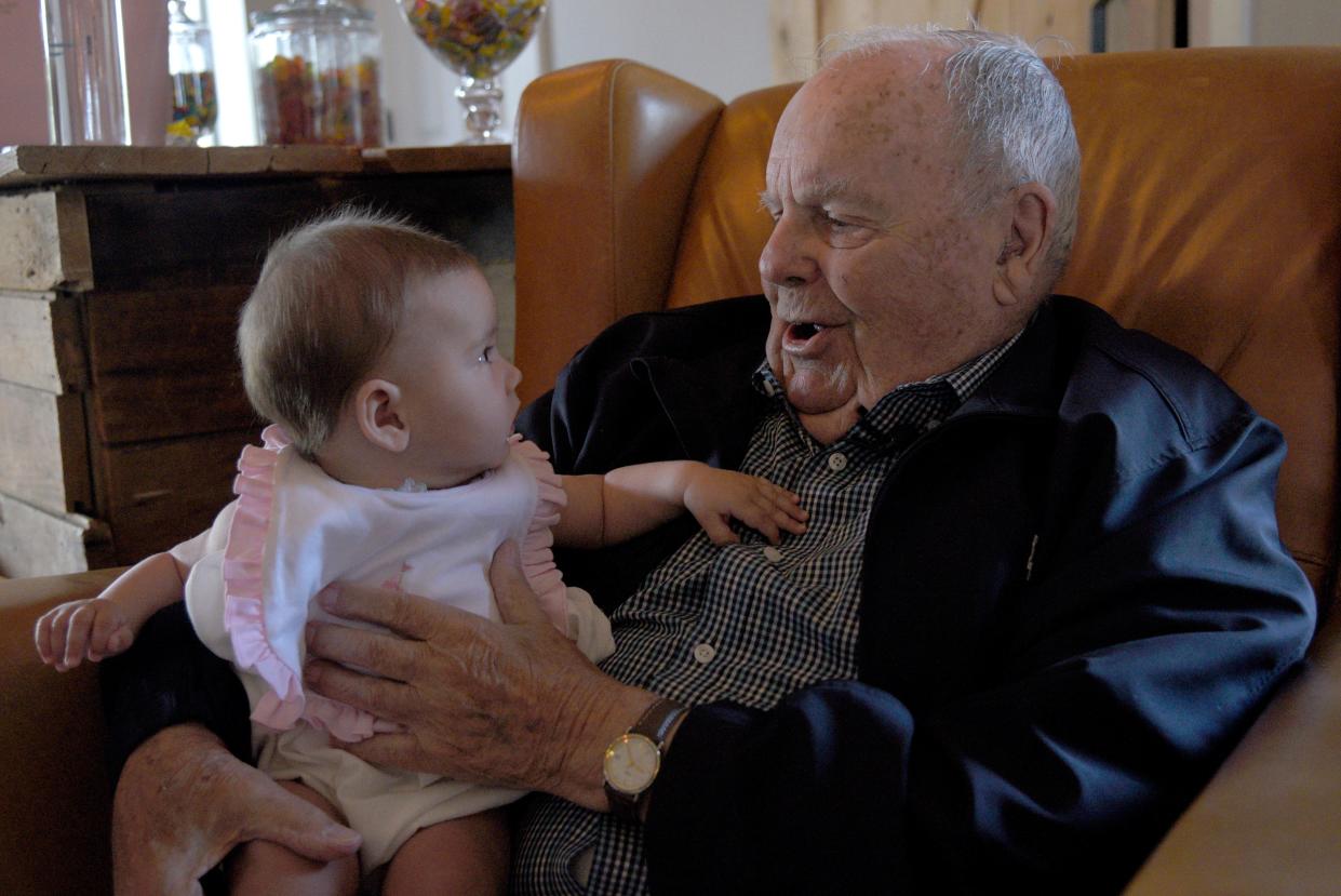 Robert Doane, 99, with his five-month-old granddaughter Madeline Miller on Saturday, July 22, 2023 at Monmouth Executive Airport in Wall, New Jersey. Doane turns 100 on July 25. 