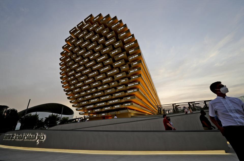 People visit the UK pavilion at the Dubai Expo 2020, in Dubai, United Arab Emirates, Sunday, Oct. 3, 2021. (AP Photo/Kamran Jebreili)