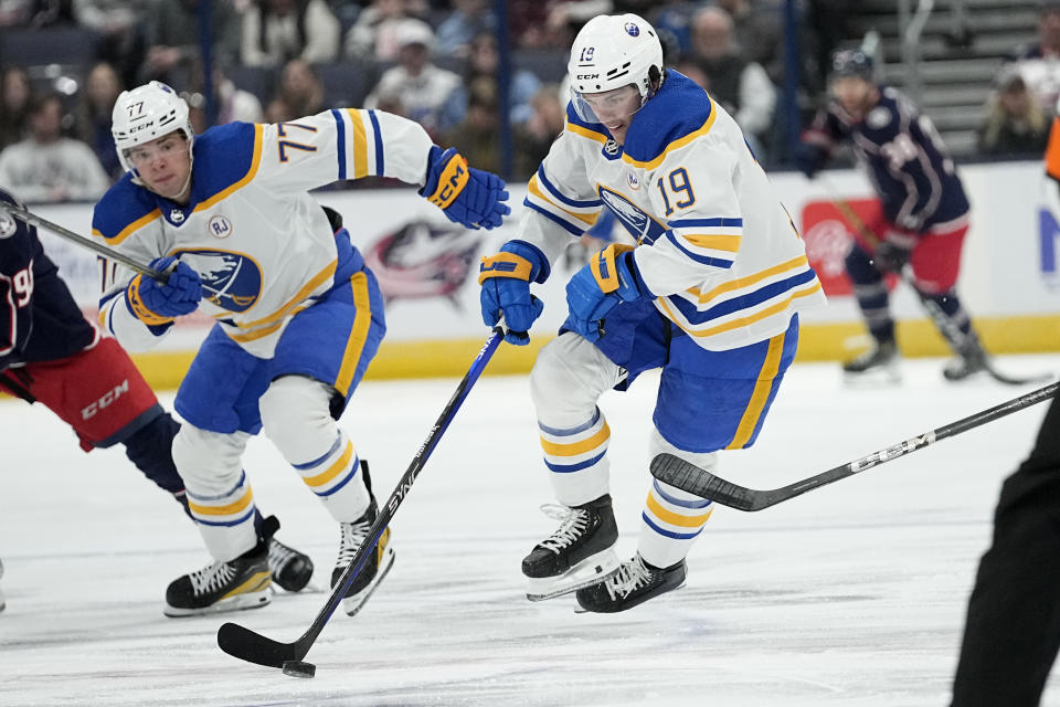 Buffalo Sabres center Peyton Krebs (19) skates up the ice with teammate JJ Peterka (77) during the first period of the team's NHL hockey game against the Columbus Blue Jackets on Friday, Feb. 23, 2024, in Columbus, Ohio. (AP Photo/Sue Ogrocki)