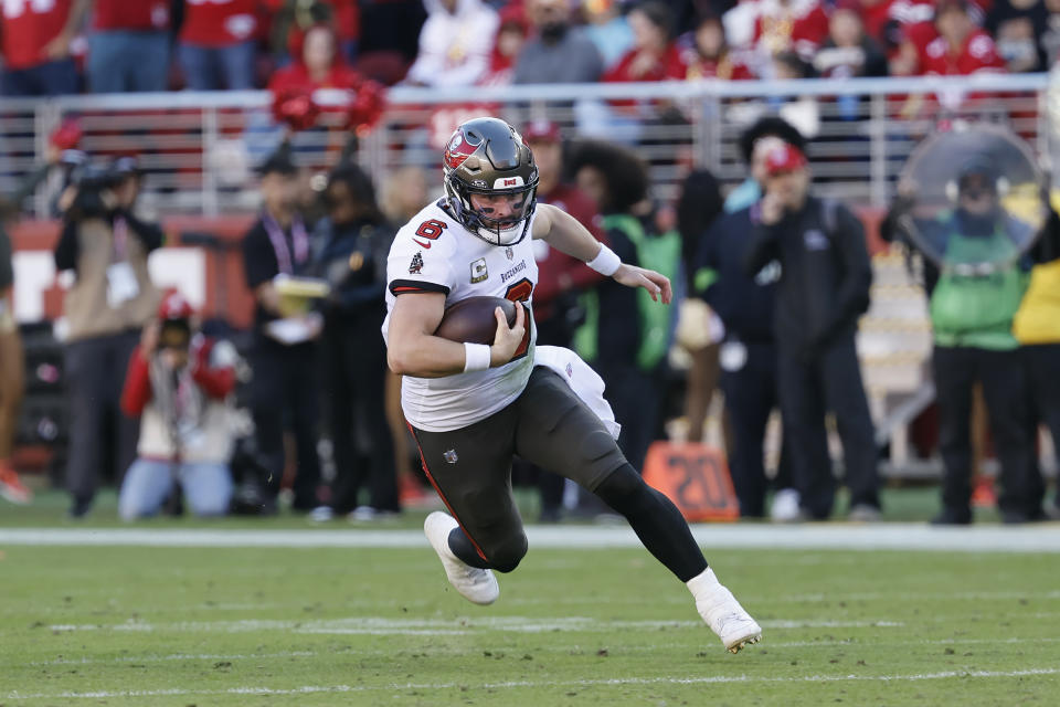 Tampa Bay Buccaneers quarterback Baker Mayfield (6) runs against the San Francisco 49ers during the first half of an NFL football game in Santa Clara, Calif., Sunday, Nov. 19, 2023. (AP Photo/Josie Lepe)