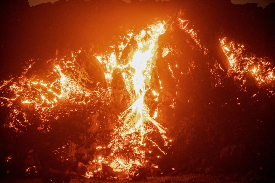 1 December 2022: Lava fountains and flows illuminate the area during the Mauna Loa volcano eruption in Hawaii, U.S. (Reuters)