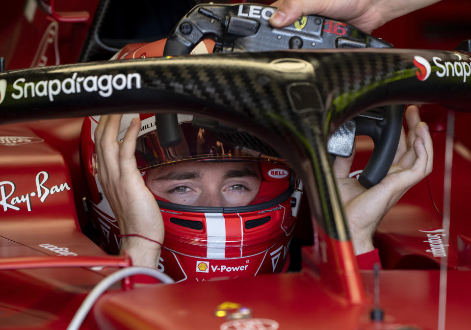 Scuderia Ferrari driver Charles Leclerc, of Monaco, grabs his steering wheel as he gets ready to hit the first practice session at the Formula One Canadian Grand Prix auto race Friday, June 17, 2022, in Montreal. (Paul Chiasson/The Canadian Press via AP)