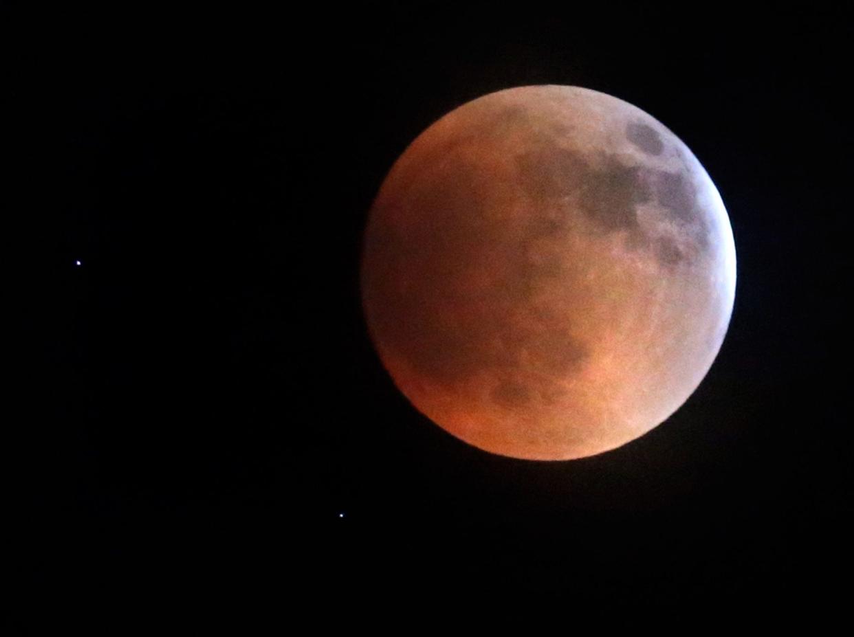 A full lunar eclipse created a "blood moon" Sunday. This photo was taken from Plain Township.