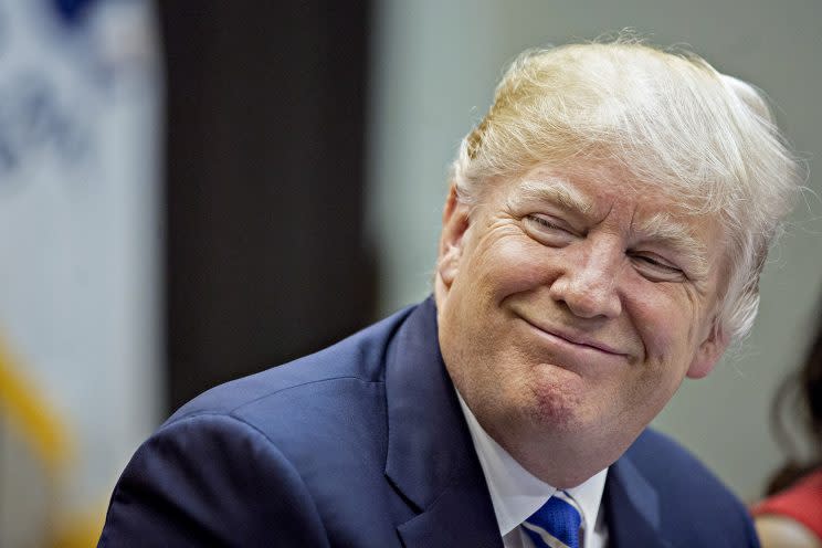 President Trump smiles.