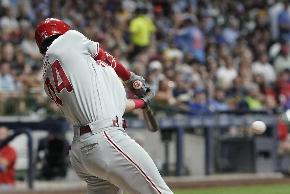 Philadelphia Phillies' Jake Cave hits a single during the third inning of a baseball game against the Milwaukee Brewers Friday, Sept. 1, 2023, in Milwaukee. (AP Photo/Morry Gash)
