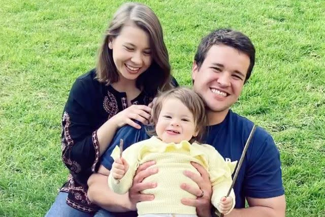 <p>Instagram/bindisueirwin</p> Bindi Irwin, Chandler Powell and their daughter Grace.