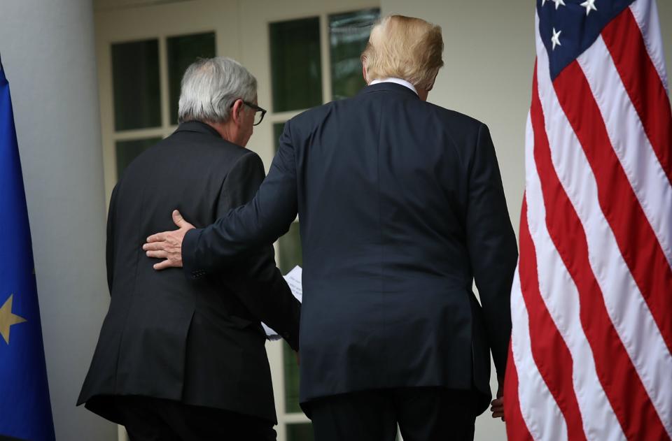 President Donald Trump resorted to resting his hand on the EU chief’s back after a failed handhold attempt. Source: Getty