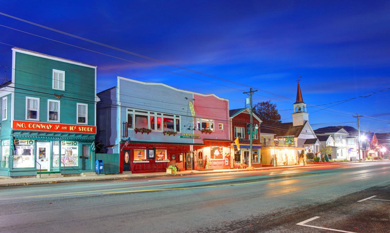 North Conway, New Hampshire, USA - October 3, 2020: Morning view of shops and restaurants along Main Street in the downtown district